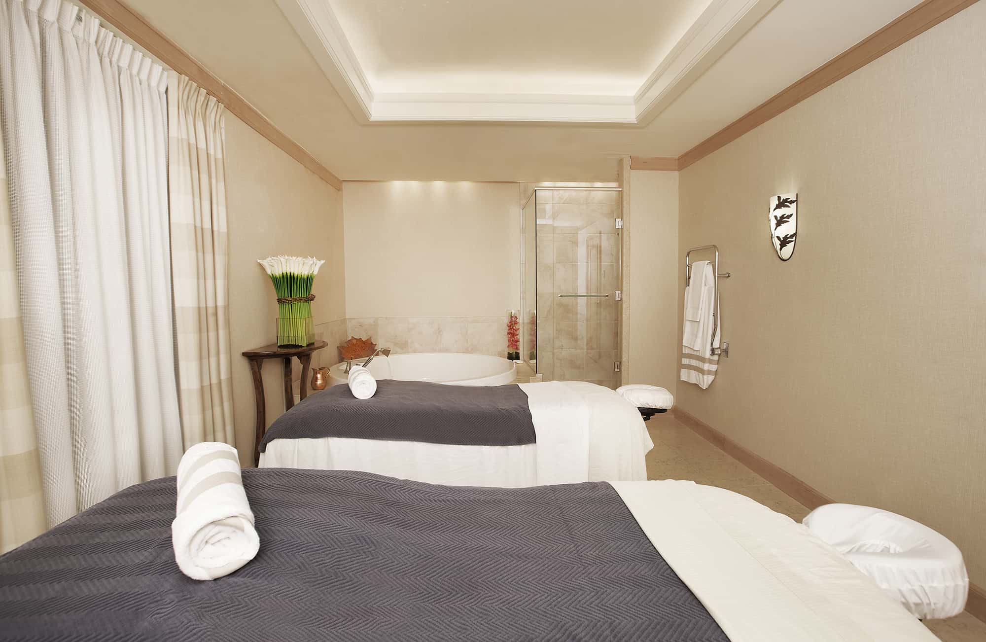 Couples treatment room with shower and bath